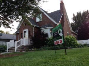 For sale sign house